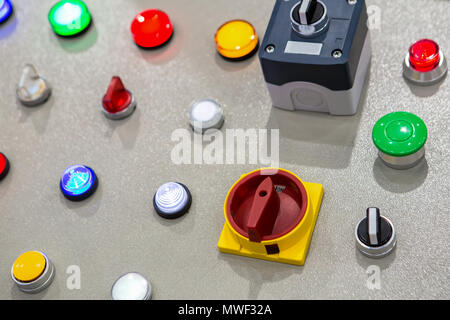 Electrical control panel contains switch buttons for operating industrial machine and factory equipment in industry Stock Photo