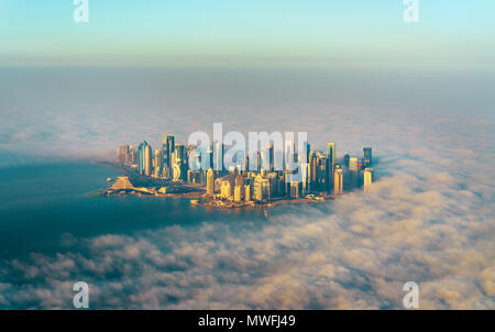 Aerial view of Doha through the morning fog - Qatar, the Persian Gulf Stock Photo
