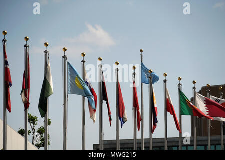 flags waving outside united nations building in manhattan new york Stock Photo