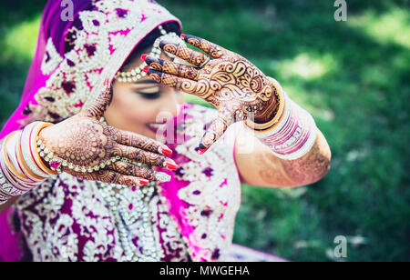 pakistani wedding bridal woman hands with beautiful mehndi design hands of indian bride girl with henna arts mwgeha