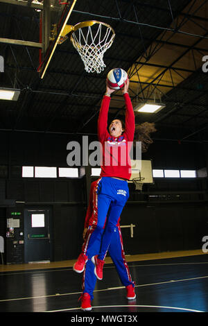 The Harlem Globetrotters are legendary worldwide, synonymous with one-of-a-kind family entertainment and great basketball skills for the past 90 years.  Throughout their history, the Original Harlem Globetrotters have showcased their iconic talents in 122 countries and territories on six continents, often breaking down cultural and societal barriers while providing fans with their first-ever basketball experience.   Proud inductees of the Naismith Memorial Basketball Hall of Fame, the Globetrotters have entertained hundreds of millions of fans - among them popes, kings, queens, and presidents  Stock Photo