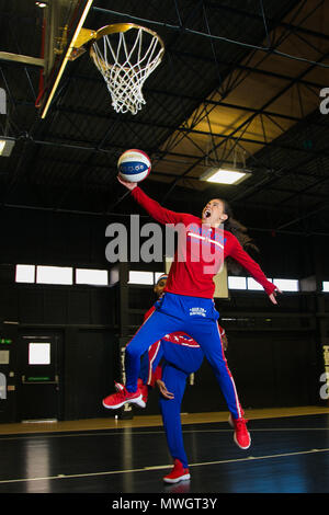 The Harlem Globetrotters are legendary worldwide, synonymous with one-of-a-kind family entertainment and great basketball skills for the past 90 years.  Throughout their history, the Original Harlem Globetrotters have showcased their iconic talents in 122 countries and territories on six continents, often breaking down cultural and societal barriers while providing fans with their first-ever basketball experience.   Proud inductees of the Naismith Memorial Basketball Hall of Fame, the Globetrotters have entertained hundreds of millions of fans - among them popes, kings, queens, and presidents  Stock Photo