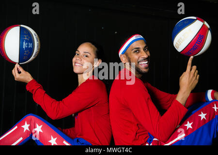 The Harlem Globetrotters are legendary worldwide, synonymous with one-of-a-kind family entertainment and great basketball skills for the past 90 years.  Throughout their history, the Original Harlem Globetrotters have showcased their iconic talents in 122 countries and territories on six continents, often breaking down cultural and societal barriers while providing fans with their first-ever basketball experience.   Proud inductees of the Naismith Memorial Basketball Hall of Fame, the Globetrotters have entertained hundreds of millions of fans - among them popes, kings, queens, and presidents  Stock Photo