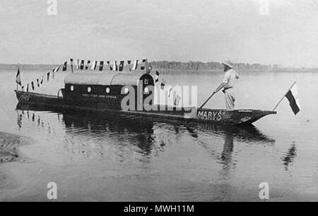 . On 'Maryś' (in Polish means: Mary) boat on an African river. The photo probably taken by Kazimierz Nowak (1897-1937, the author is on the photo; taken probably by a self-timer) during his trip through Africa - a Polish traveller, correspondent and photographer. Probably the first man in the world who crossed Africa alone from the North to the South and from the South to the North (from 1931 to 1936; on foot, by bicycle and canoe). circa about 1931-36. probably Kazimierz Nowak or an unknown author 404 Marys boat 2 Stock Photo