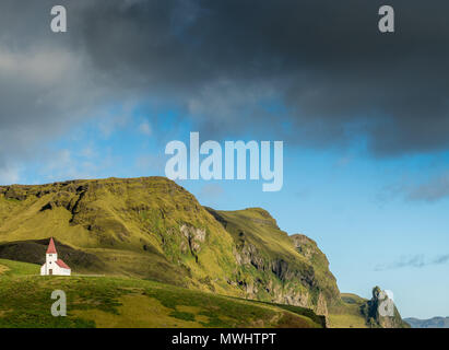 the iconic small church of Vik. Placed on hill above town it's placed in a beautiful setting. Stock Photo