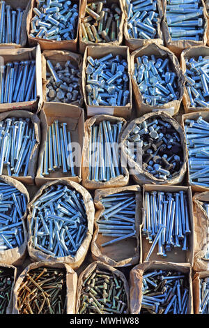 Boxes of Bolts and Screws in Hardware Store Stock Photo