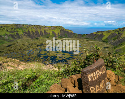 Viewpoint on crater rim, Rano Kau extinct volcano, with wetland in crater and ocean beyond, Easter Island, Rapa Nui, Chile Stock Photo