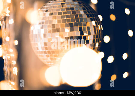 classic disco ball with christmas lights around Stock Photo