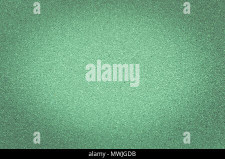 Texture of granite green color with small dots, with vignetting. Stock Photo