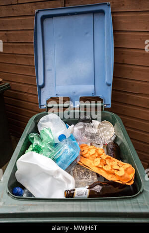 English blue bin with open lid filled with recycling Stock Photo