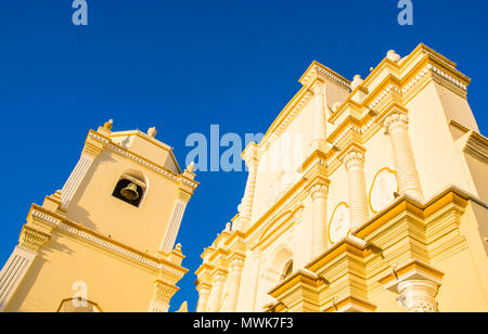 LEON, NICARAGUA, MAY, 16, 2018: Beautiful outdoor view of the front facade of the Church of the Recoleccion, in a gorgeous sunny day and blue sky background in Leon Stock Photo