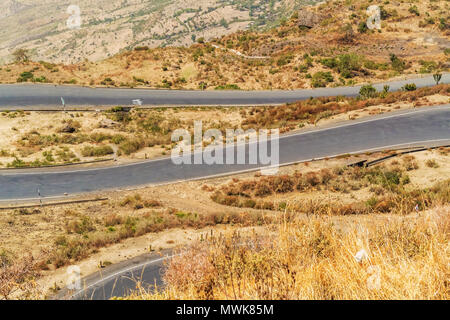 Mountain landscape North Shewa between Blue Nile bridge and Gohatsion also called Blue Nile Gorge. It is very steep ride from the bridge. Stock Photo