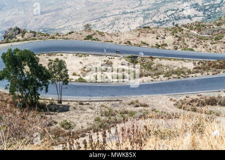 Mountain landscape North Shewa between Blue Nile bridge and Gohatsion also called Blue Nile Gorge. It is very steep ride from the bridge. Stock Photo