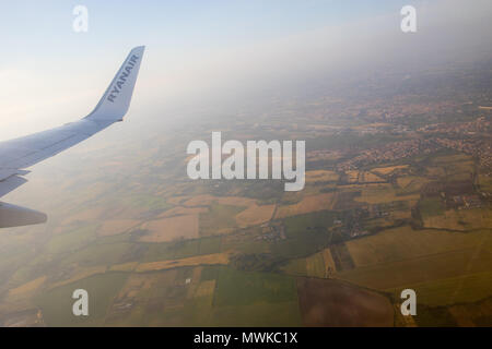 Airbus wing Ryanair, view true window, Europe Stock Photo