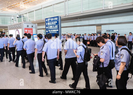 Police,immigration,officers,at,Huge,Beijing Capital International Airport,PEK,Terminal 3,serving,Beijing,Airport,Beijing Airport,,China,Chinese,Asia, Stock Photo