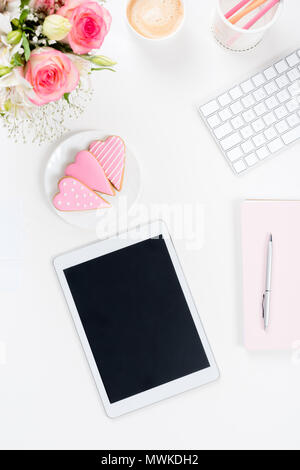 top view of digital tablet with blank screen lying at workplace Stock Photo