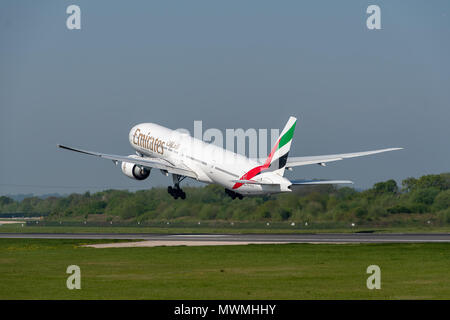 MANCHESTER, UNITED KINGDOM - MAY 07, 2018: Emirates Boeing 777 departing Manchester airport Stock Photo