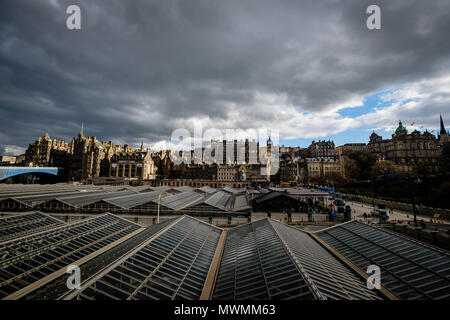 View of Edinburghs Market Street as seen from Waverly Station, with the stations glass ceiling in the foreground. Edinburgh, Scotland. Stock Photo