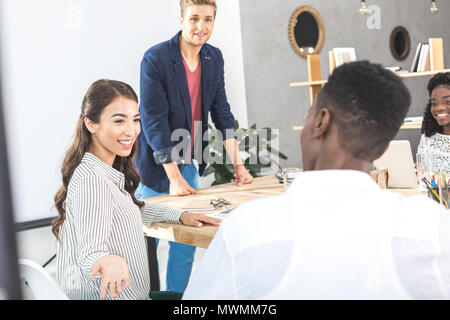 multiethinc business coworkers having conversation during conference in office Stock Photo