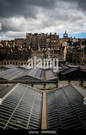 View of Edinburghs Market Street as seen from Waverly Station, with the stations glass ceiling in the foreground. Edinburgh, Scotland. Stock Photo