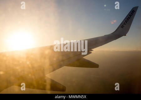 Airbus wing Ryanair, view true window, Europe Stock Photo