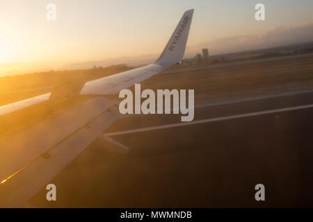 Airbus wing Ryanair, view true window, Europe Stock Photo