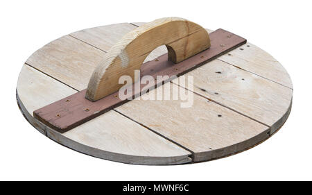 Wooden rounded lid with handle isolated on white background Stock Photo