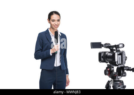 beautiful smiling female journalist with microphone looking at camera, isolated on white Stock Photo