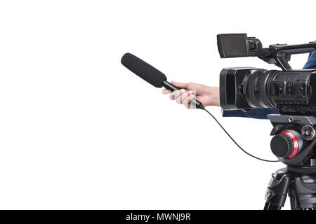cropped view of video camera and female hand with microphone, isolated on white Stock Photo