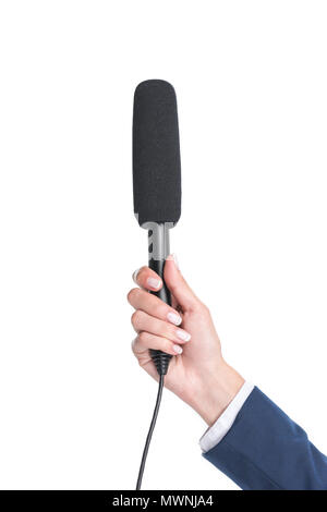 cropped view of female hand holding microphone for interview, isolated on white Stock Photo