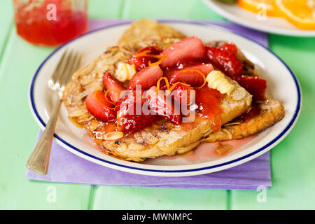 French almond toasts with strawberries Stock Photo