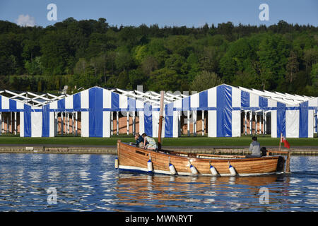 Boat tents erected on the bank of the River Thames in preparation for Henley Royal Regatta, Oxfordshire, UK Stock Photo