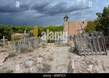 El Rancho de Las Golondrinas (Ranch of the Swallows), adobe Spanish Colonial Penitente Meeting House with graveyard, near Santa Fe, NM, USA Stock Photo