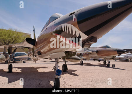 An F-105G Thunderchief United States military aircraft under bright blue skies Stock Photo