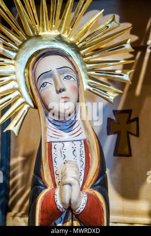 Washington DC,Smithsonian American Art Museum,exhibit exhibition collection icon,Virgin Mary,Catholic,wood sculpture,carving,virgin,praying,halo,gold Stock Photo
