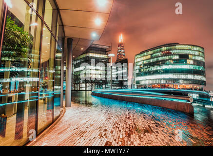 Fisheye view of The Scoop London and The Shard visible in background at night, Southwark, London, England, United Kingdom, Europe Stock Photo