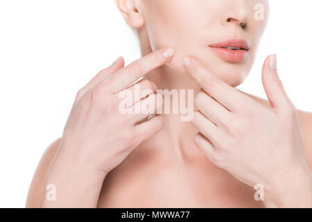 Cropped view of female touching own face by fingers isolated on white Stock Photo