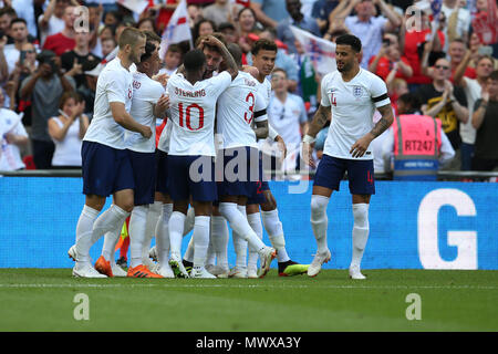Wembley Stadium, London, UK. 2nd Jun, 2018. Gary Cahill of England © celebrates with his teammates after he scores his teams 1st goal. Football International friendly, England v Nigeria at Wembley Stadium in London on Saturday 2nd June 2018.  this image may only be used for Editorial purposes. Editorial use only, license required for commercial use. No use in betting, games or a single club/league/player publications. pic by Andrew Orchard//Andrew Orchard sports photography/Alamy Live news Stock Photo