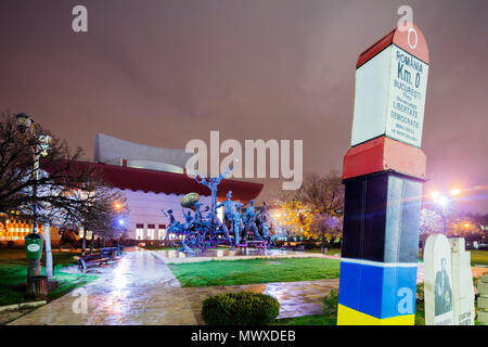 University Square, city mile marker, National Theatre, statue of musicial comedians by Ioan Bolborea, Bucharest, Romania, Europe Stock Photo