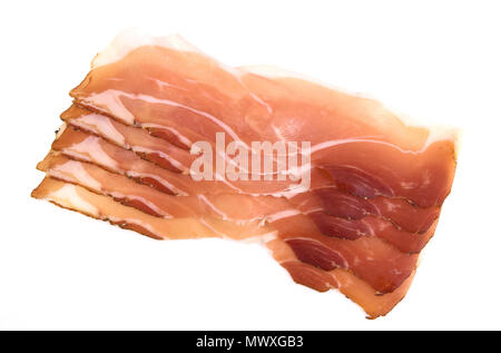 Italian speck or Italian prosciutto crudo, raw ham, slices isolated on white background, with clipping path. Stock Photo