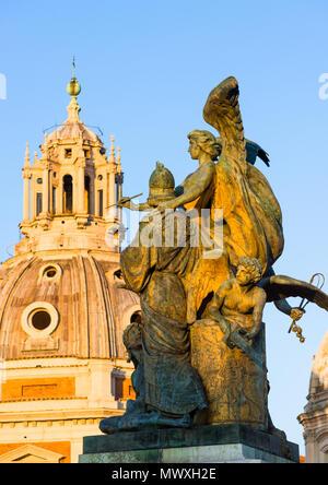 Bronze sculpture at the entrance to Monumento Nazionale a Vittorio Emanuele II with the Church of Santa Maria di Loreto, Rome, Lazio, Italy, Europe Stock Photo