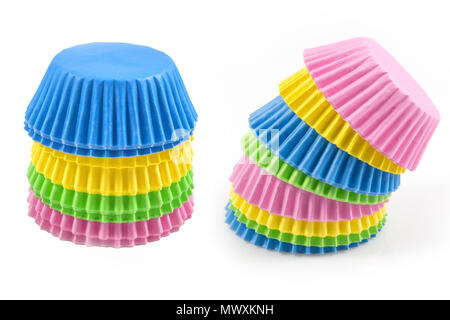 Colorful cupcake, paper cups, muffin cup isolated on white background, Stack of paper cupcakes, muffins on white background. Stock Photo