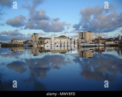 . Cherbourg-Octeville Français : Vu du bassin du Commerce en hiver. Capitainerie, tours du Casino, hôte Epron, commisariat, DDE, marina  Camera location 49° 38′ 15″ N, 1° 37′ 17.76″ W  View this and other nearby images on: OpenStreetMap - Google Earth 49.637500; -1.621600  . 3 January 2010. HaguardDuNord (talk) 22:32, 26 April 2010 (UTC) 126 Cherbourg, Bassin de commerce sous le soleil d'hiver (1) Stock Photo