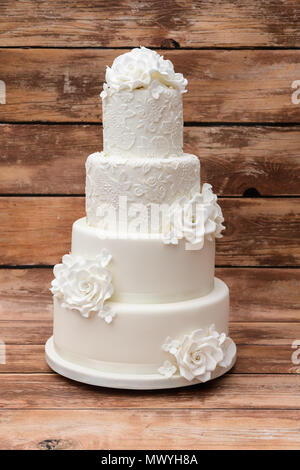 Four tier white wedding cake Stock Photo