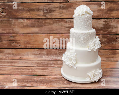 Four tier white wedding cake Stock Photo