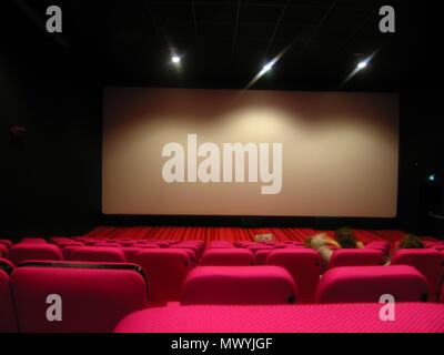 Interior with pink seats of movie theatre Stock Photo