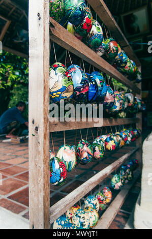 Indonesia, Bali, Ubud, village of artists, painting on wooden egg Stock Photo
