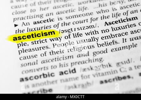 Highlighted English word 'asceticism' and its definition in the dictionary. Stock Photo