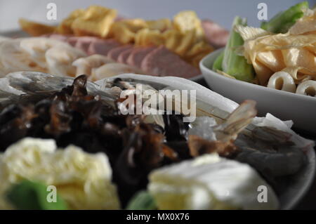 Assortment of food tofu, vegetables and meat for chinese hotpot Stock Photo