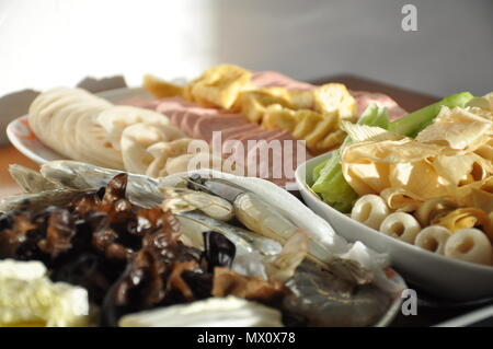 Assortment of food tofu, vegetables and meat for chinese hotpot Stock Photo